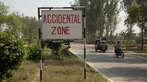 Getty Images A sign on the highway that connects New Dehli to Mathura, India.