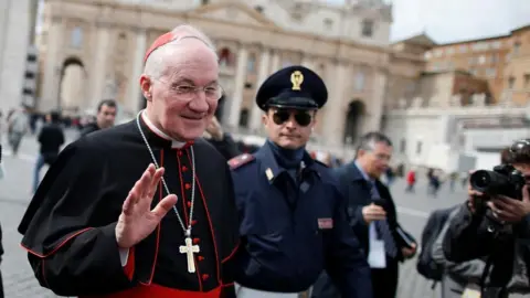 Reuters Cardinal Marc Ouellet of Canada walks through Saint Peter