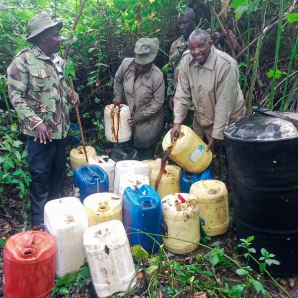 Police destroy 360 litres of illicit liquor in a raid on a hideout along River Chania » Capital News